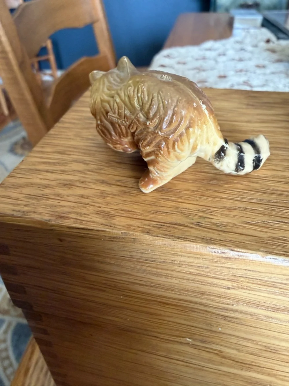 Mini pair of raccoon figurines